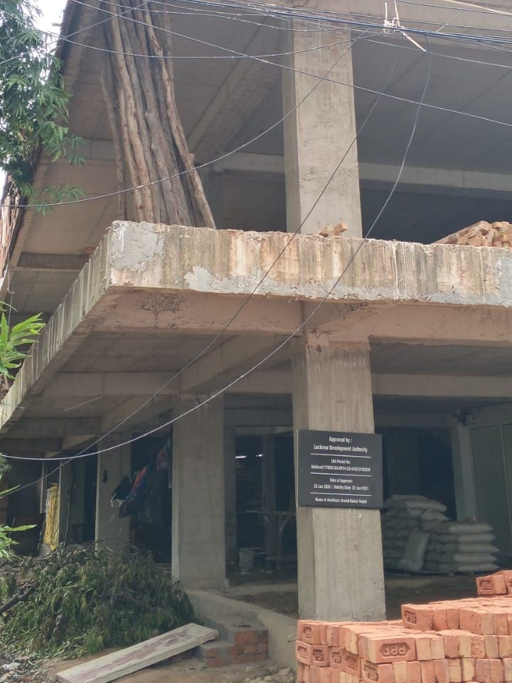 The Lucknow Development Authority approval board on a stilt-level column